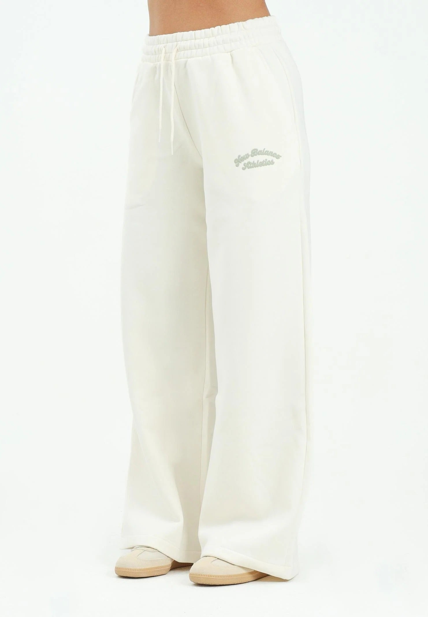 New Balance PANTALONI Bianco